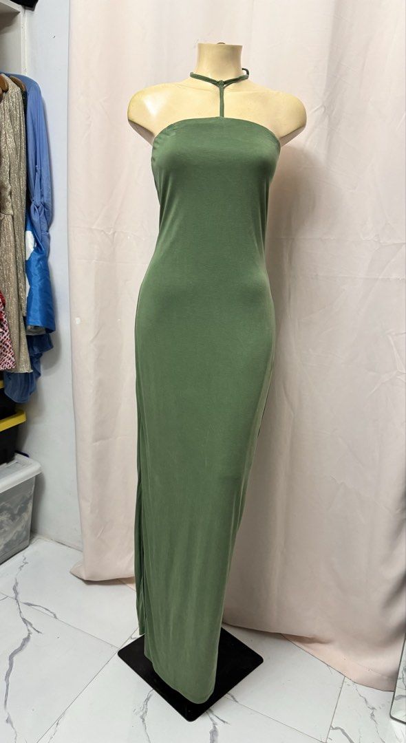 Green fitted dress (Category: Evening dresses & gowns) located in Manila. Submitted by mariadarna (Listing ID 1468690200, Image 1). Description: Long knitted green dress with slit.