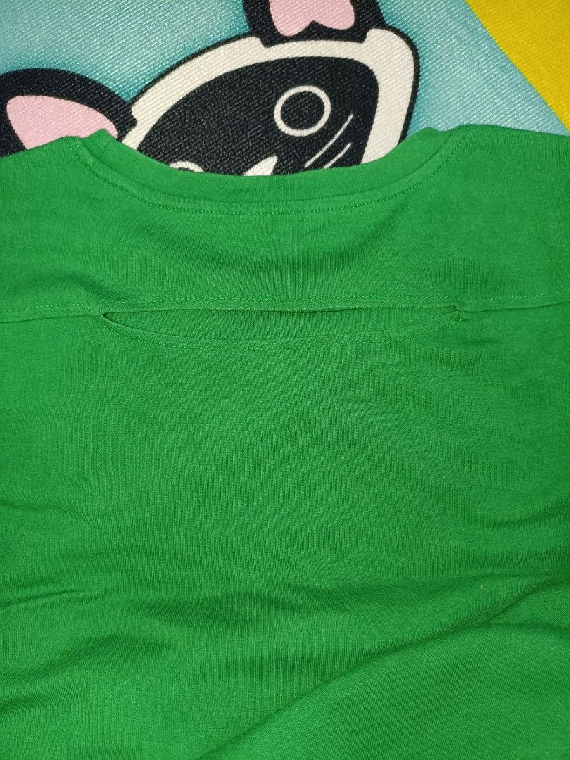 Green Graphic Backless Shirt (Category: Shirts) located in Santa Maria. Submitted by abclosetph (Listing ID 1467427583, Image 3). Description: medida size! bust: 34-36 length: 19.5 - issue is stated - color may vary due to lighting - manage your expectations, these are preloved items..