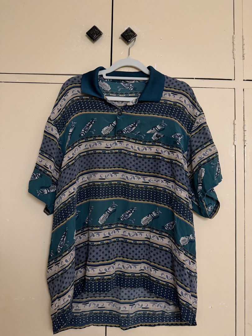 Green pattern vintage polo shirt (Category: Tshirts & Polo Shirts ) located in Quezon City. Submitted by sufjanxcx (Listing ID 1468686386, Image 1). Description: Negotiable Kind of an oversized fit Size S-L Very cute and looks vintage.