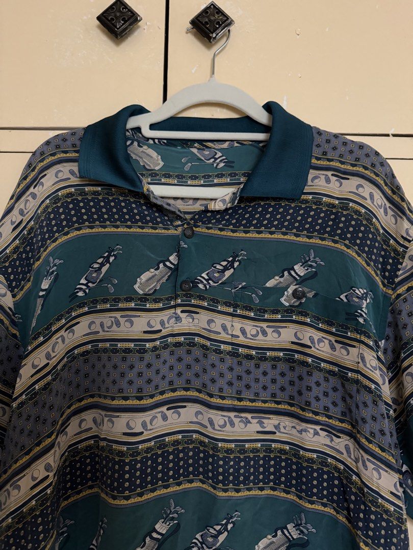 Green pattern vintage polo shirt (Category: Tshirts & Polo Shirts ) located in Quezon City. Submitted by sufjanxcx (Listing ID 1468686386, Image 3). Description: Negotiable Kind of an oversized fit Size S-L Very cute and looks vintage.