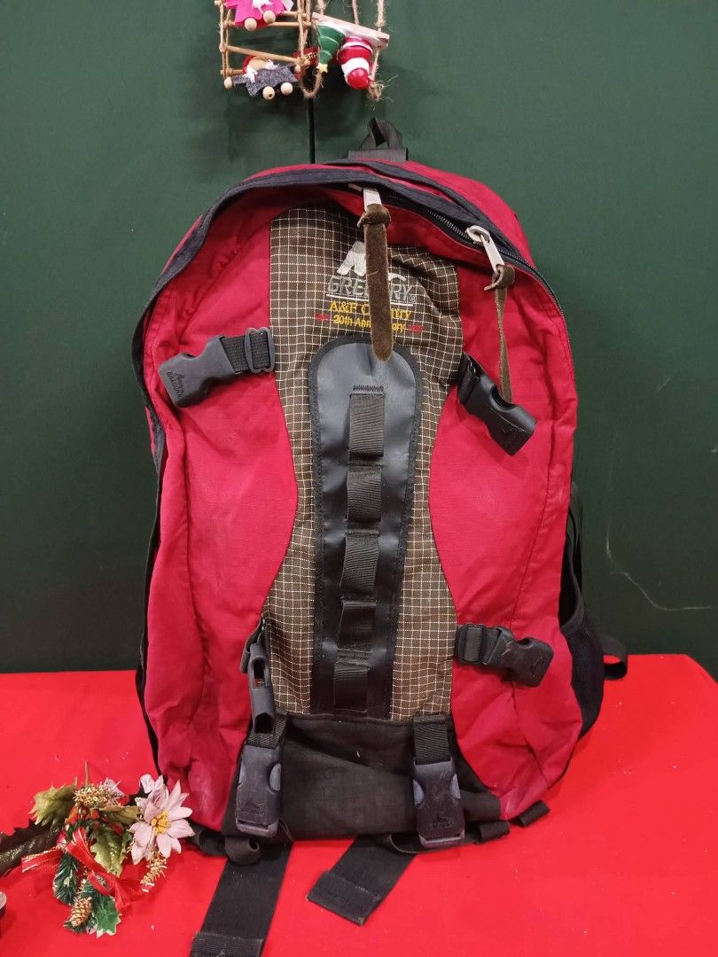 Gregory A&F Country 20th Anniversary Red Backpack (Category: Backpacks) located in Daet. Submitted by jemotovlog28 (Listing ID 1468532425, Image 1). Description: - Authentic Gregory backpack from the exclusive A&F Country 20th anniversary collection - Eye-catching bright red body with stylish brown grid center paneling - Durable black leather-like vertical strip equipped with functional gear loops - Versatile buckle straps on the front, sides, an