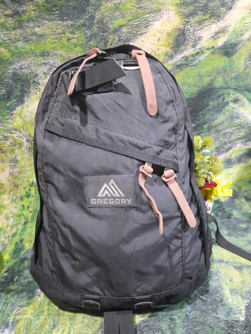 Gregory Black Backpack with Leather Details (Category: Backpacks) located in Baguio. Submitted by klayblakeb87803 (Listing ID 1468596641, Image 1). Description: - Authentic black Gregory backpack - Clean interior and exterior, ready to use - Features stylish leather pull tabs and front zipper pocket - Iconic brand logo patch on the lower front - Padded shoulder straps equipped with convenient D-rings - Wide-opening main compartment with an interi