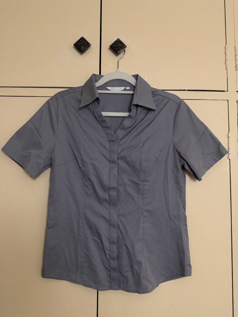 Grey fitted button down top (Category: Blouses) located in Quezon City. Submitted by sufjanxcx (Listing ID 1468685475, Image 1). Description: Size XS-M Negotiable Very cute and has a cinched shape.