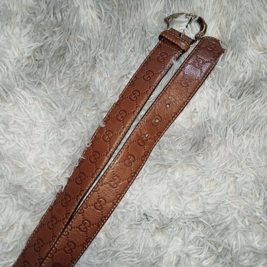 GUCCI BAMBOO BUCKLE BELT (Category: Belts) located in Cavite. Submitted by realdeal98 (Listing ID 1468669548, Image 2). Description: GUCCI BAMBOO BUCKLE BELT - Monogram - Good condition - Missing side bamboo please check the photos Measurement: 3 holes 104 cm from buckle to end 4.4 cm width 3000 shipped via JNT.