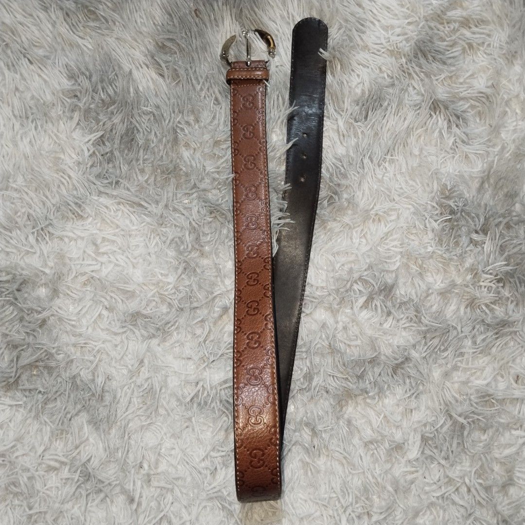 GUCCI BAMBOO BUCKLE BELT (Category: Belts) located in Cavite. Submitted by realdeal98 (Listing ID 1468669548, Image 3). Description: GUCCI BAMBOO BUCKLE BELT - Monogram - Good condition - Missing side bamboo please check the photos Measurement: 3 holes 104 cm from buckle to end 4.4 cm width 3000 shipped via JNT.