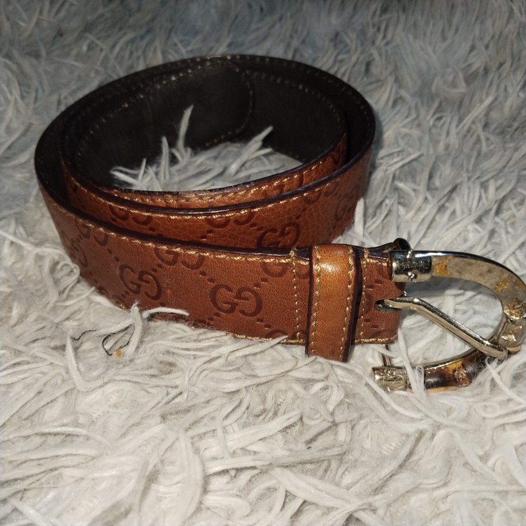 GUCCI BAMBOO BUCKLE BELT (Category: Belts) located in Cavite. Submitted by realdeal98 (Listing ID 1468669548, Image 1). Description: GUCCI BAMBOO BUCKLE BELT - Monogram - Good condition - Missing side bamboo please check the photos Measurement: 3 holes 104 cm from buckle to end 4.4 cm width 3000 shipped via JNT.