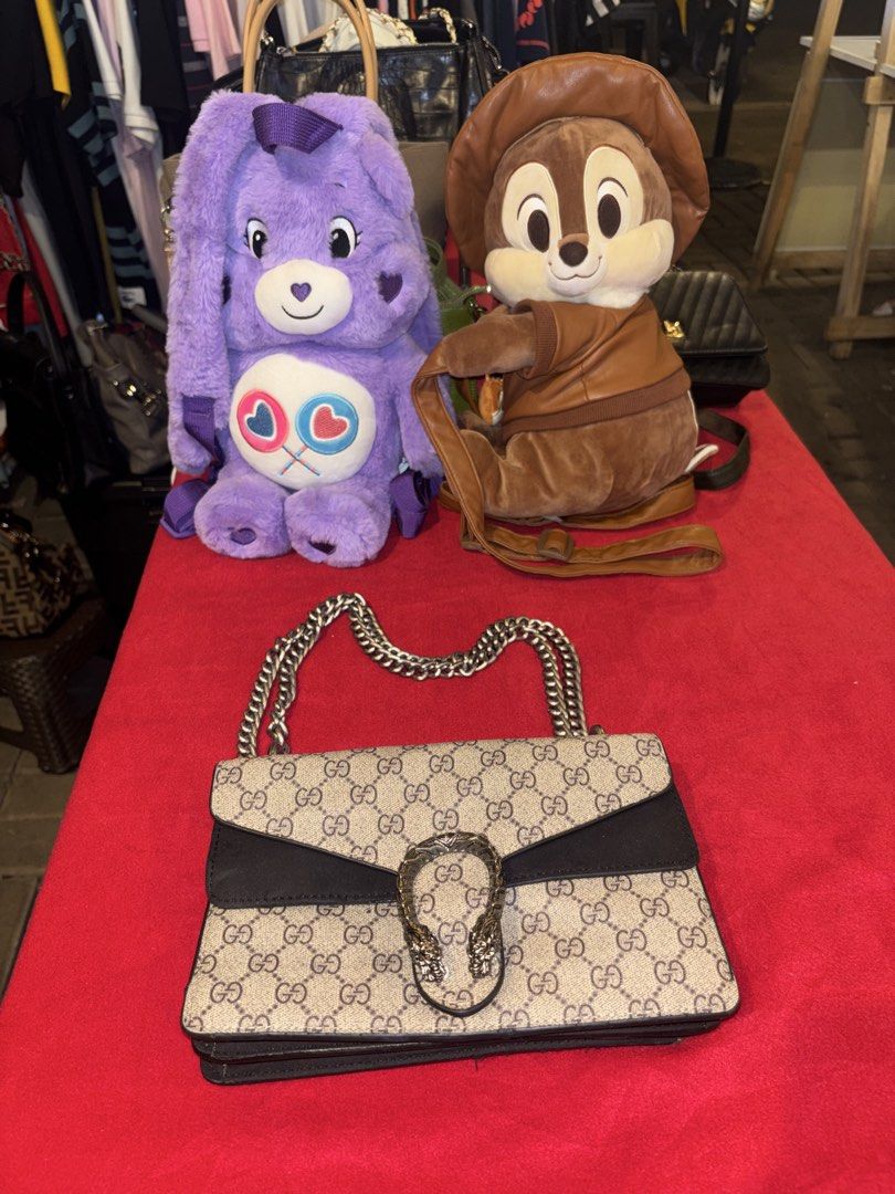 Gucci GG Supreme Dionysus Shoulder Bag (Category: Luxury Bags & Wallets) located in Manila. Submitted by jeromskito66462 (Listing ID 1468675048, Image 1). Description: - Authentic Gucci GG Supreme shoulder bag - Signature canvas pattern with black suede front flap panels - Silver-tone chain strap and textured horseshoe closure with tiger head detail - Spacious interior with a zippered divider pocket and fabric lining - Serial number tag included 