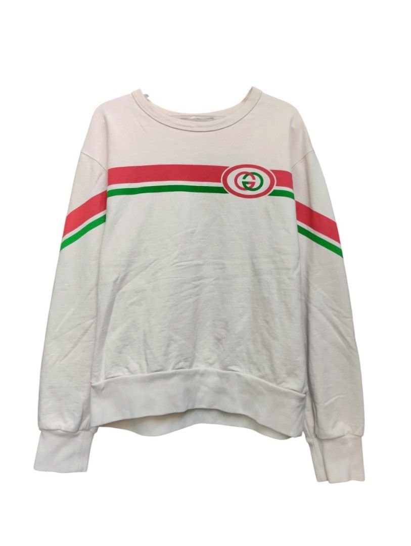 Gucci Interlocking G Stripe Sweatshirt White XL (Category: Coats, Jackets and Outerwear) located in Manila. Submitted by niggzreyno51476 (Listing ID 1468512114, Image 2). Description: - Brand: Gucci - Color: White - Size: XL (Comfortable oversized fit) - Material: Cotton - Origin: Made in China - Design: Iconic red & green stripe with interlocking G logo across chest and sleeves - Style: Classic crewneck with ribbed cuffs and hem.