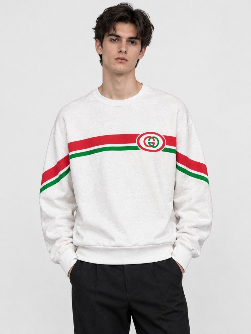 Gucci Interlocking G Stripe Sweatshirt White XL (Category: Coats, Jackets and Outerwear) located in Manila. Submitted by niggzreyno51476 (Listing ID 1468512114, Image 1). Description: - Brand: Gucci - Color: White - Size: XL (Comfortable oversized fit) - Material: Cotton - Origin: Made in China - Design: Iconic red & green stripe with interlocking G logo across chest and sleeves - Style: Classic crewneck with ribbed cuffs and hem.