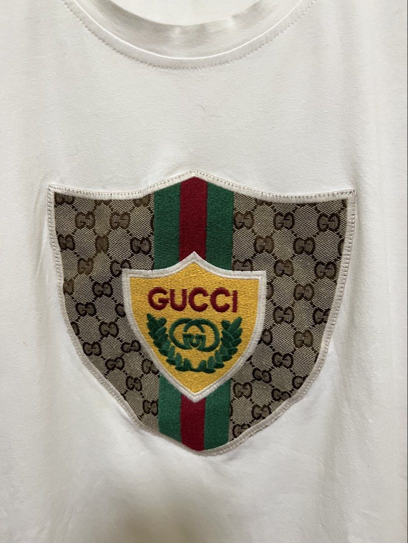 Gucci Patch Logo Design White Shirt (Category: Shirts) located in Manila. Submitted by thriftpoint99 (Listing ID 1468690242, Image 3). Description: 20.5x27 Issue pinhole and cutwashtags Excellent condition.