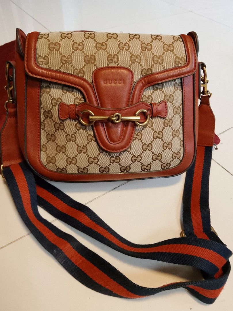 Gucci sling (Category: Luxury Bags & Wallets) located in Manila. Submitted by wildwind_73f77a (Listing ID 1468589566, Image 2). Description: good condition no issue.