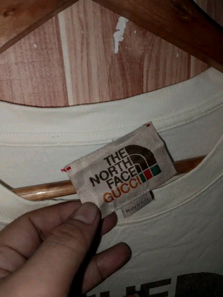 GUCCI X TNF (Category: Tshirts & Polo Shirts ) located in Taguig. Submitted by clothingselection (Listing ID 1468662733, Image 2). Description: PTPA GUCCI X TNF LASER PRINT 23.5 X 30 VERYGOOD CONDITION NID WASH FRESH FROM BALE LOOSE STITCH LANG KABILANG TAHI SA NECKTAG.