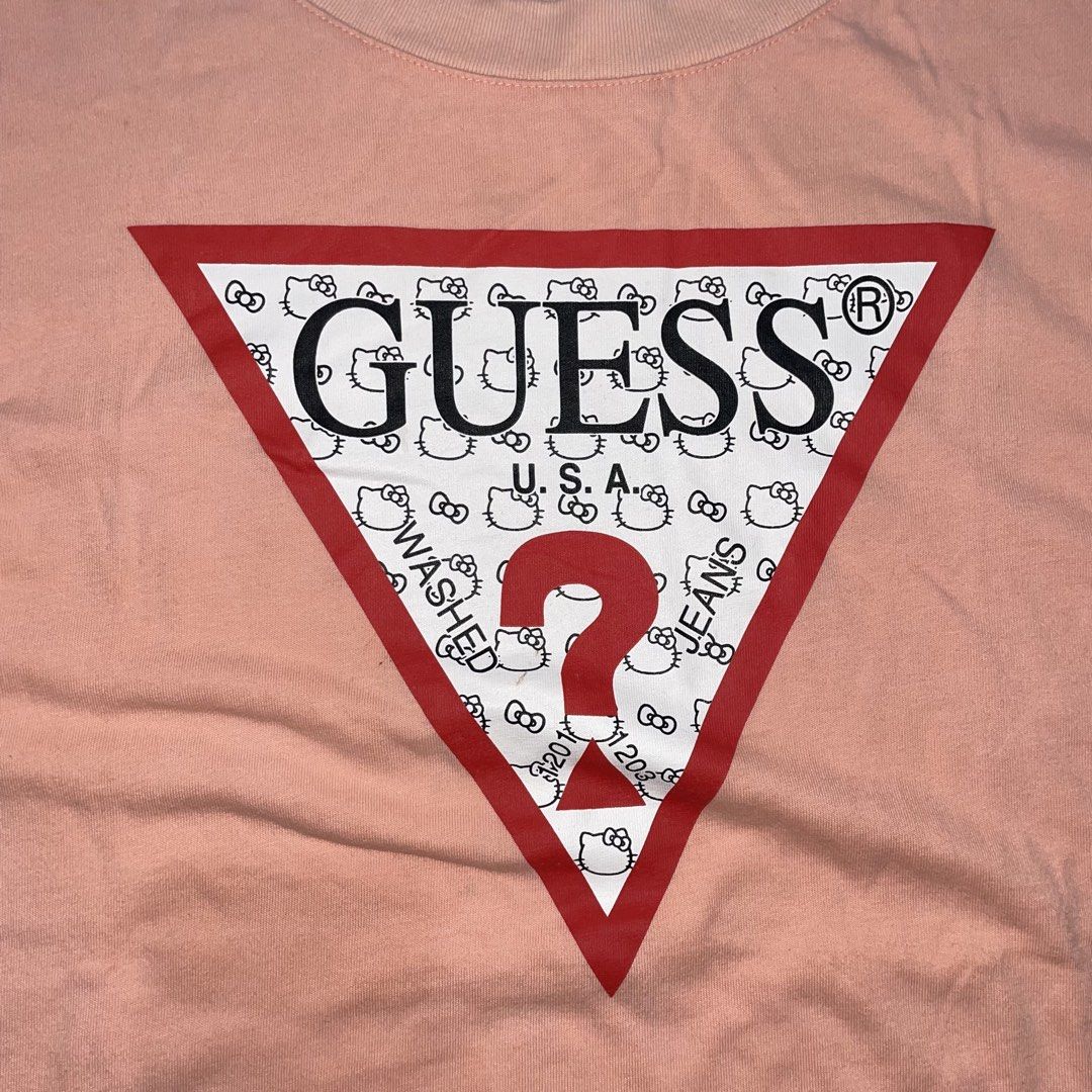 GUESS (Category: Tshirts & Polo Shirts ) located in Caloocan City. Submitted by thriftytripter (Listing ID 1468580397, Image 3). Description: +Shipping fee width • 22.5 length • 29/29.5 sleeves • 10 condition • 8.5/10 color rate • 8.5/10 issue • fading • Check details before buying • Items are washed and ready to wear • Color may vary due to lighting.