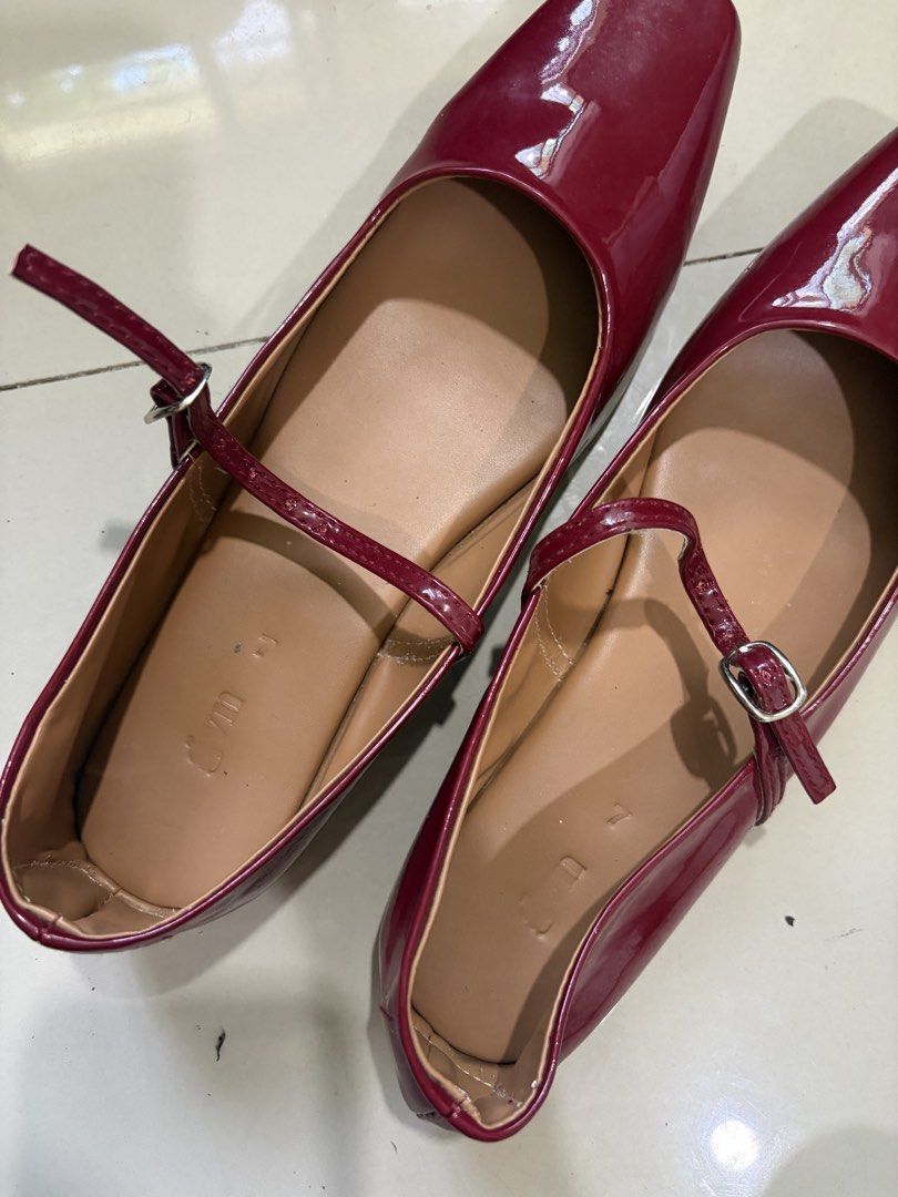 GVN Roberta Mary Janes (Category: Flats & Sandals) located in Quezon City. Submitted by pandesauuur (Listing ID 1468565347, Image 3). Description: - Wine red patent leather Mary Jane flats - Chic square toe design with a glossy finish - Secure buckle strap with easy slip-on support - Comfortable flat sole for all-day wear - Tan inner lining - Lightly used.
