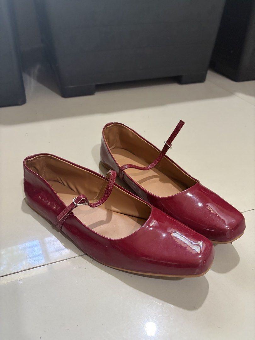 GVN Roberta Mary Janes (Category: Flats & Sandals) located in Quezon City. Submitted by pandesauuur (Listing ID 1468565347, Image 1). Description: - Wine red patent leather Mary Jane flats - Chic square toe design with a glossy finish - Secure buckle strap with easy slip-on support - Comfortable flat sole for all-day wear - Tan inner lining - Lightly used.