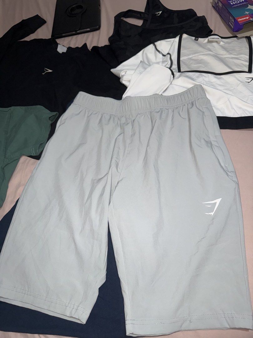 Gymshark Grey Training Shorts 🩶 (Category: Activewear) located in Pasay City. Submitted by bellita_05 (Listing ID 1468692649, Image 2). Description: • Brand: Gymshark • Colour: Light grey • Size: Small (S) • Style: Athletic / training shorts • Elastic waistband with drawstring • Side pockets • Lightweight fabric with mesh lining • Made in Vietnam Perfect for gym workouts, running and everyday activewear..