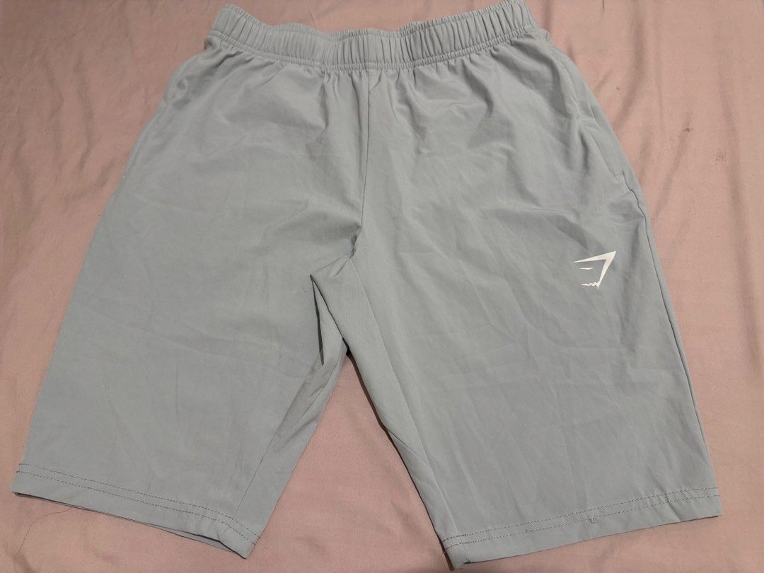 Gymshark Grey Training Shorts 🩶 (Category: Activewear) located in Pasay City. Submitted by bellita_05 (Listing ID 1468692649, Image 1). Description: • Brand: Gymshark • Colour: Light grey • Size: Small (S) • Style: Athletic / training shorts • Elastic waistband with drawstring • Side pockets • Lightweight fabric with mesh lining • Made in Vietnam Perfect for gym workouts, running and everyday activewear..