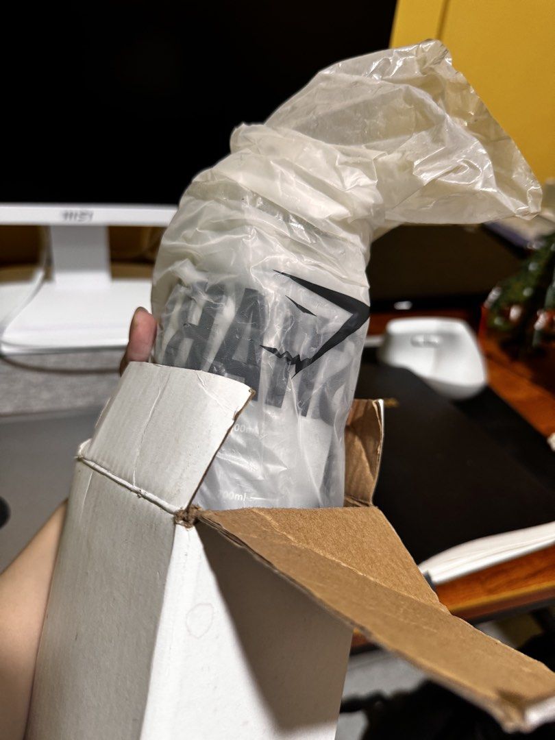 Gymshark Grey Water Bottle With Strap (Category: Water Bottles & Tumblers) located in Manila. Submitted by ivoryscloset (Listing ID 1468518477, Image 3). Description: - Authentic Gymshark frosted grey water bottle - Features a large white vertical logo on the side - Clear flip-top lid equipped with a secure latch - Convenient black carrying strap for easy transport - Brand new in original white box and plastic wrapping - Ideal for the gym, runnin
