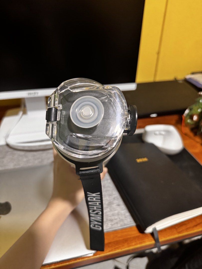 Gymshark Grey Water Bottle With Strap (Category: Water Bottles & Tumblers) located in Manila. Submitted by ivoryscloset (Listing ID 1468518477, Image 2). Description: - Authentic Gymshark frosted grey water bottle - Features a large white vertical logo on the side - Clear flip-top lid equipped with a secure latch - Convenient black carrying strap for easy transport - Brand new in original white box and plastic wrapping - Ideal for the gym, runnin