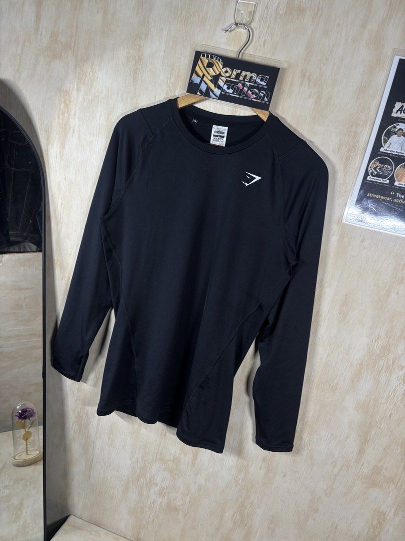 GYMSHARK REACT LONG SLEEVE (Category: Tshirts & Polo Shirts ) located in Cabuyao City. Submitted by pormanation-thrift-store (Listing ID 1468608583, Image 3). Description: GYMSHARK REACT LONG SLEEVE Condition: LIKE NEW Color rate: 10/10 (PWEDE SA MASELAN) Size: MEDIUM Dimes: 18”Wx28”L Issue: NONE‼️ Price: 1000.