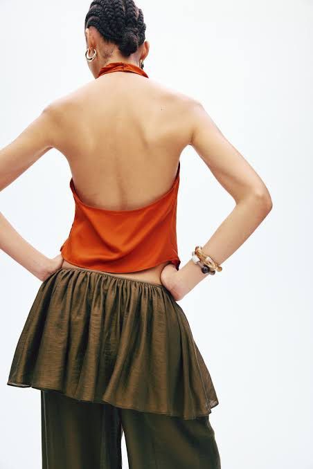 Halter Neck Satin Top (Rust Orange) (Category: Sleeveless) located in Pasig City. Submitted by thriftventure_mnl (Listing ID 1468511795, Image 3). Description: - authentic! from h&m moa - bnew w tag 🧡🌅 - srp is 799 - rfs not my size - dont lowball too much given that its bnew. thank you :) PAYMENT VIA: BDO Gcash COD (for manila & pasig area) DELIVERY VIA: Grabdelivery Lalamove J&T Express.