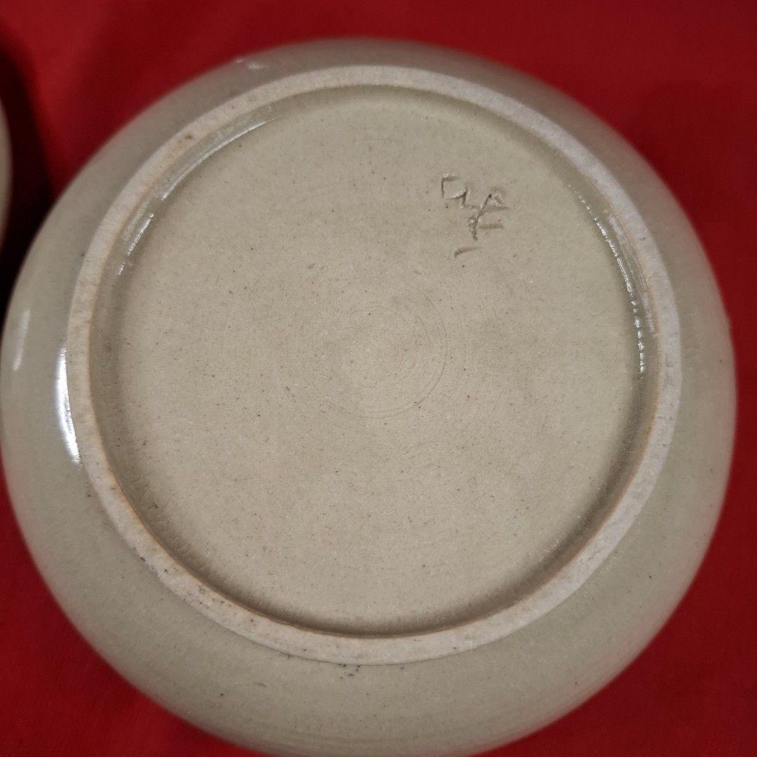 Handmade Ceramic Sugar Bowl with Lid Blue Floral Pattern (Category: Vases & Decorative Bowls) located in Mandaluyong City. Submitted by edward123_andren (Listing ID 1468708102, Image 3). Description: - Handmade stoneware ceramic pot - Delicate blue floral design on off-white glaze - Includes matching fitted lid with pointed finial knob - Features maker's stamp on the base - Opening measures approx. 11 cm across - Smooth interior glaze, perfect fo