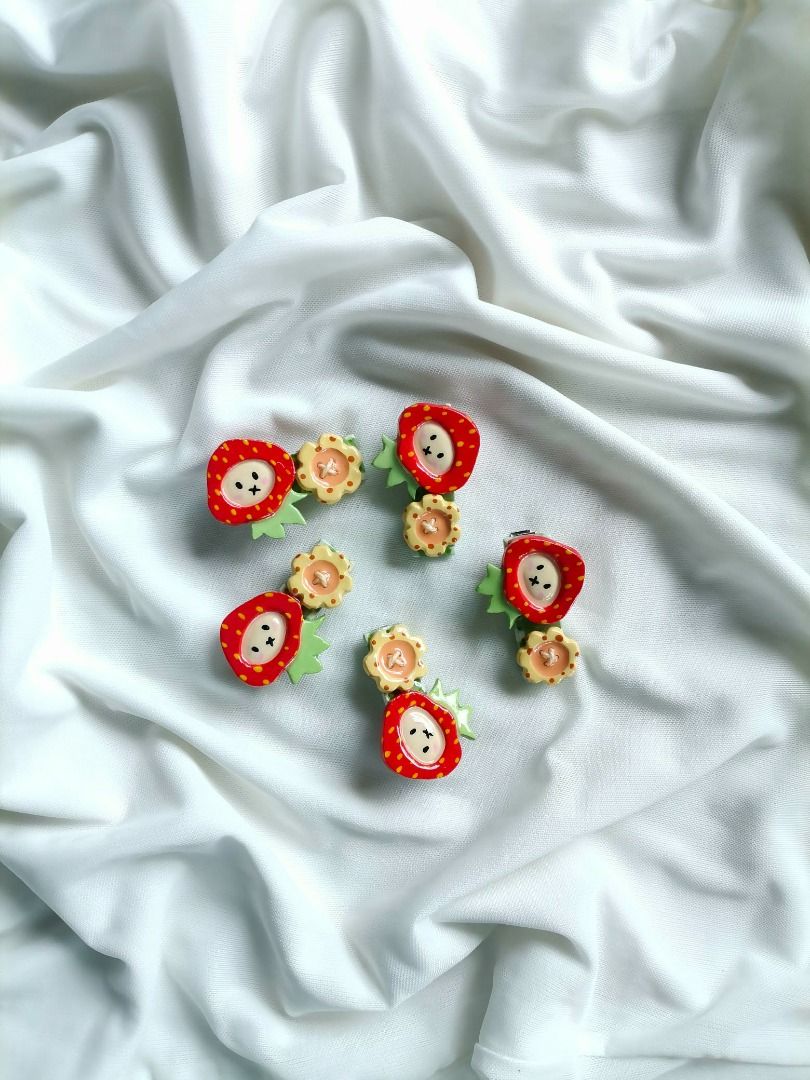 Handmade Clay Hair Clips Set Cute Designs (Category: Hair Accessories) located in Caloocan City. Submitted by mauve.trouvaille.clay (Listing ID 1468594014, Image 2). Description: - Handcrafted polymer clay hair clips with a shiny glossy finish - Cute designs: ladybugs on clover, happy strawberries, pastel butterflies, and mini apples - Fitted with secure metal alligator clips on the back - Fun and colorful accessories to elevate your daily OOTD -