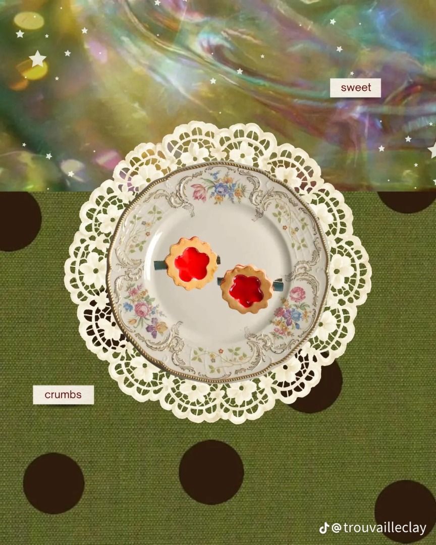 Handmade Clay Jam Biscuit Hair Clips (Category: Hair Accessories) located in Caloocan City. Submitted by trouvaille.clay (Listing ID 1468595045, Image 2). Description: - Handmade polymer clay hair clips shaped like miniature jam biscuits - Features realistic flaky cookie edges with bright red jam centers - Available in circular flower and star cutouts - Secured firmly on durable alligator hair clips - Lightweight design ideal for everyday wear or