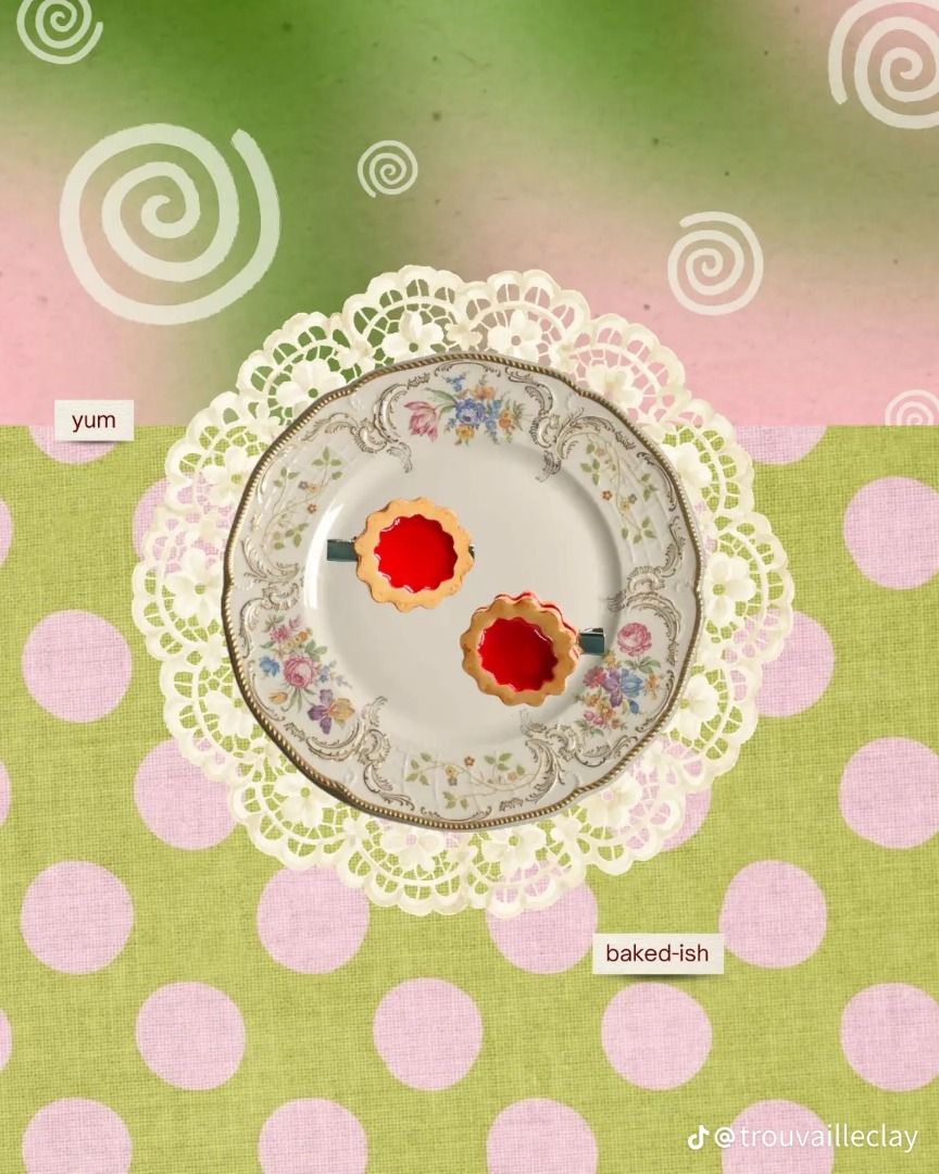 Handmade Clay Jam Biscuit Hair Clips (Category: Hair Accessories) located in Caloocan City. Submitted by trouvaille.clay (Listing ID 1468595045, Image 3). Description: - Handmade polymer clay hair clips shaped like miniature jam biscuits - Features realistic flaky cookie edges with bright red jam centers - Available in circular flower and star cutouts - Secured firmly on durable alligator hair clips - Lightweight design ideal for everyday wear or