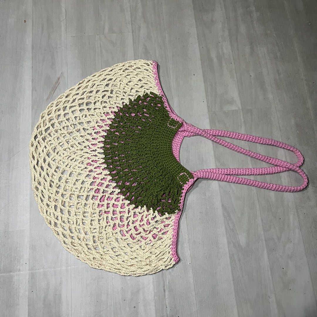 Handmade crochet mesh tote bag watermelon design (Category: Tote Bags) located in Malabon City. Submitted by lunapie (Listing ID 1468616364, Image 2). Description: - The Handmade watermelon-inspired crochet market bag - Off-white mesh body with a pink center and green rind top band - Sturdy pink shoulder straps with solid stitching - Spacious and practical for grocery runs, farmers markets, or beach trips - Unique piece with clean, high-quality y