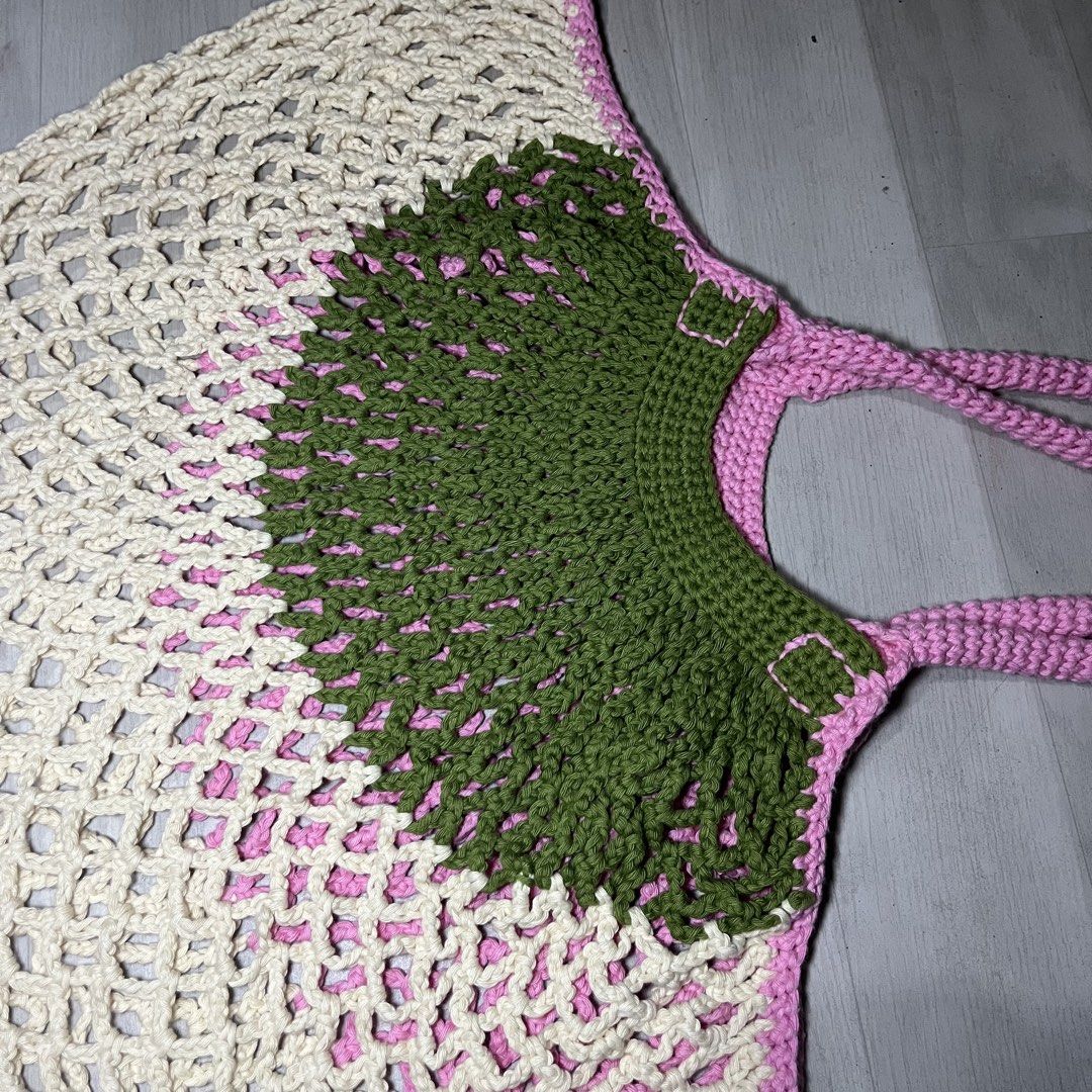 Handmade crochet mesh tote bag watermelon design (Category: Tote Bags) located in Malabon City. Submitted by lunapie (Listing ID 1468616364, Image 1). Description: - The Handmade watermelon-inspired crochet market bag - Off-white mesh body with a pink center and green rind top band - Sturdy pink shoulder straps with solid stitching - Spacious and practical for grocery runs, farmers markets, or beach trips - Unique piece with clean, high-quality y