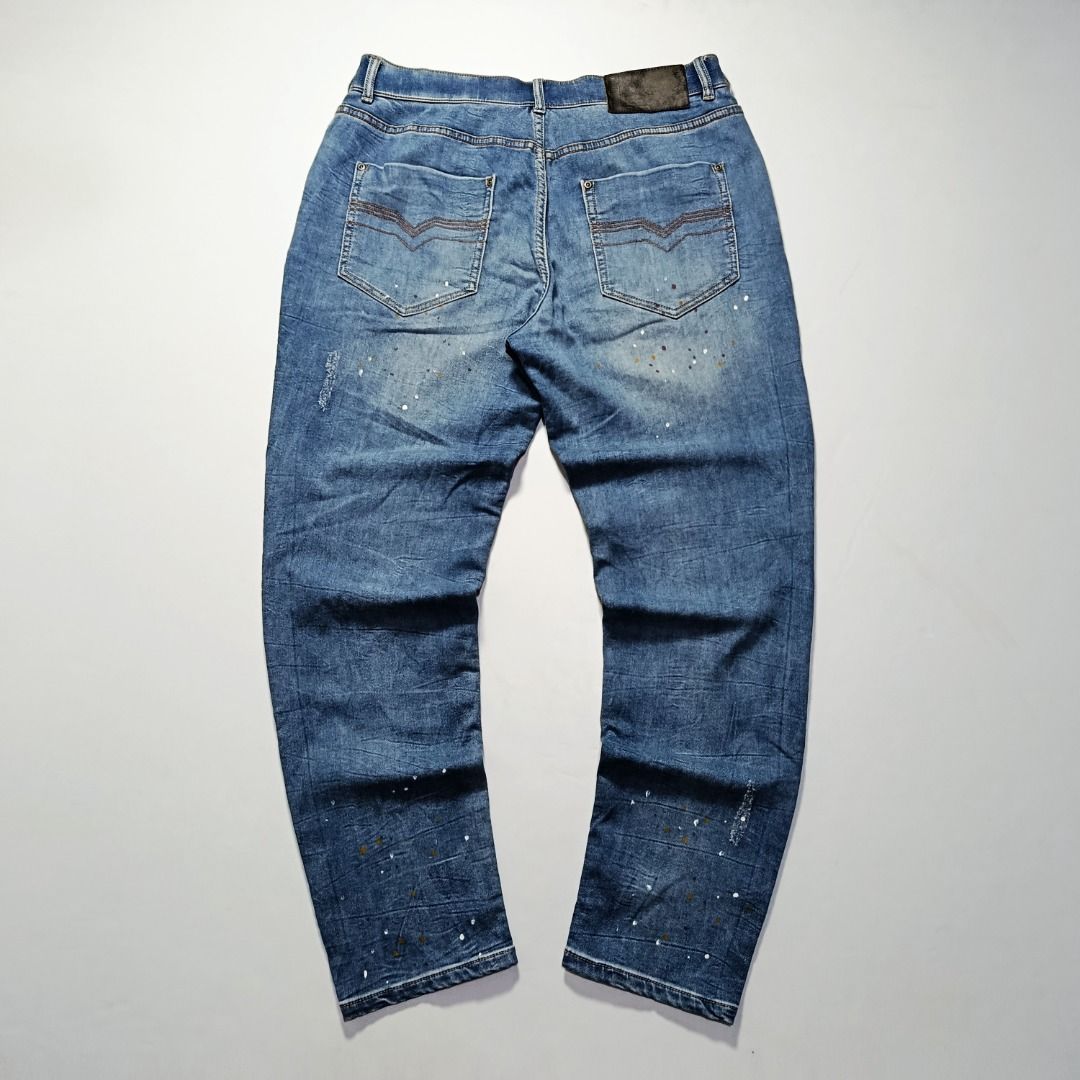 Harley-Davidson Patchwork Paint-Splatter Jeans (Category: Jeans) located in Taytay. Submitted by hoodgrail.vtg (Listing ID 1468641201, Image 2). Description: • Excellent condition - Lightly used • Distressed knee details, contrasting patchwork repairs, and multicolor paint splatters • Size on tag: XL — estimated best fit W34 • Measurements: 17 x 41 in • Leg opening: 6.5 in • Color rate: 9/10 • Issue: None.