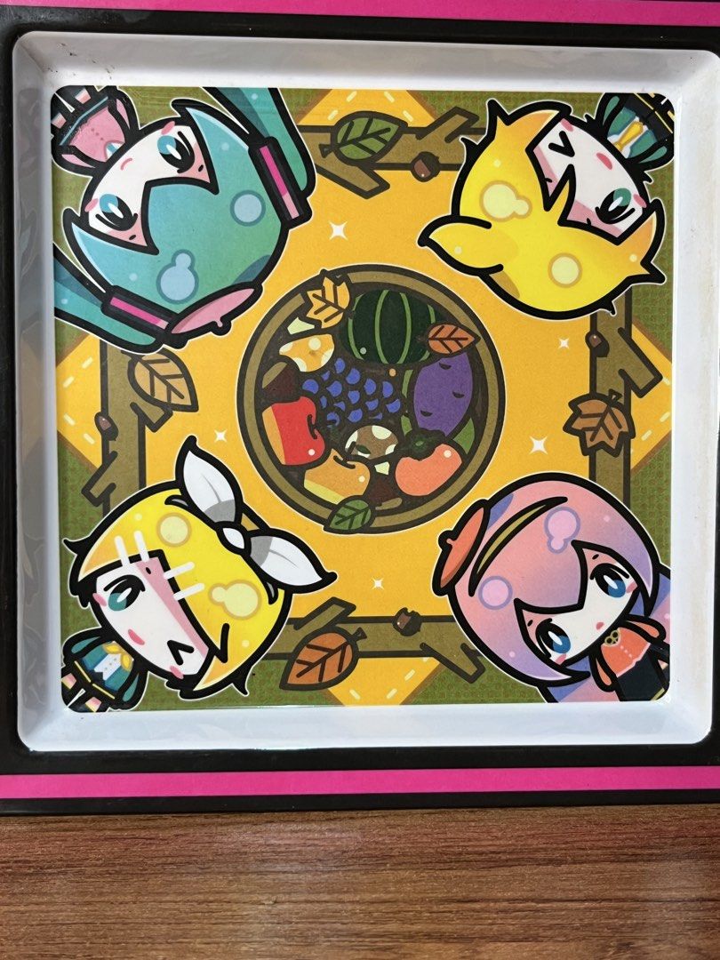 Original Hatsune Miku melamine square plate (Category: Art & Prints) located in Gapan. Submitted by lunashop14 (Listing ID 1468692571, Image 2). Description: - Official Crypton Future Media merchandise illustrated by MISONI - Features cute chibis of Hatsune Miku, Kagamine Rin, Kagamine Len, and Megurine Luka - Charming autumn fruits design with vibrant, high-quality printing - Sturdy melamine square tray with clean white back and official manufac