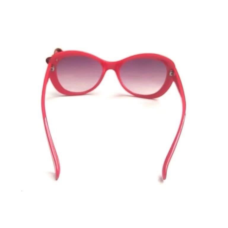 Hello Kitty Red Sunglasses with Bow Detail (Category: Sunglasses & Eyewear) located in Manila. Submitted by janetecson05 (Listing ID 1468578097, Image 2). Description: - Color: Vibrant red with Kitty graphics and text along the frame - Lenses: Stylish graduated purple lenses - Details: Adorable metallic bow charm adorned with rhinestones on the corner - Style: Fun and trendy accessory perfect for sunny days and outfits - Condition: Brand new / Ex