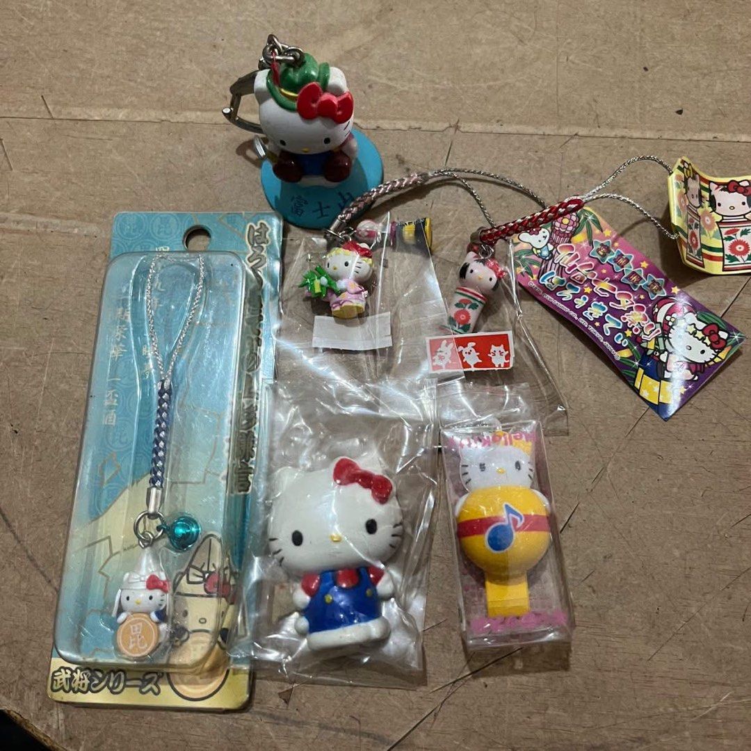 Hello Kitty Sanrio Character Keychain Figurine Charm Collection (Category: Character Goods) located in Manila. Submitted by janetecson05 (Listing ID 1468574194, Image 1). Description: - Authentic Sanrio Kitty character keychains and charms - Features rare regional and themed designs - Includes special pieces: Mount Fuji figure, samurai series phone strap, and music note whistle charm - Condition: Mix of loose items and brand new pieces still in o