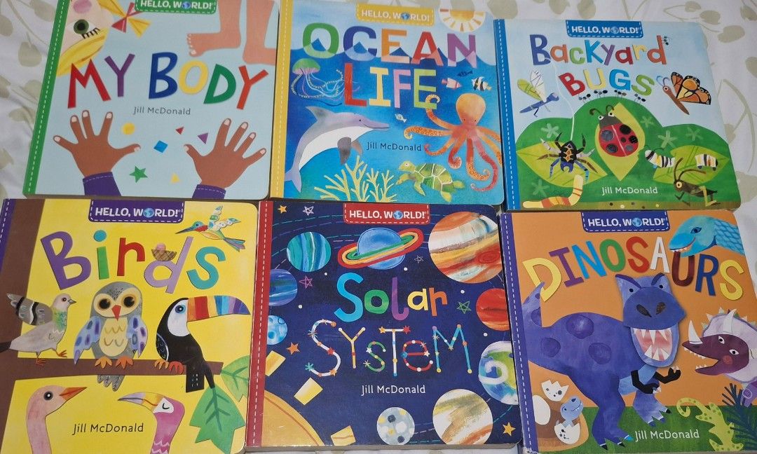 Hello, World! Board Books Set by Jill McDonald (Category: Children's Books) located in Tarlac. Submitted by littlem0mi (Listing ID 1468648083, Image 1). Description: - Set of 6 popular, World! board books by Jill McDonald - Titles: Birds, My Body, Solar System, Ocean Life, Dinosaurs, and Backyard Bugs - Sturdy, durable pages designed for young readers and toddlers - Features bright, engaging colors and simple science facts on every page - Excelle