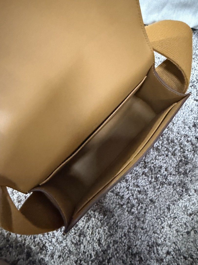 Hermes Geta Caramel Epsom Leather Bag (Category: Luxury Bags & Wallets) located in Quezon City. Submitted by jakalalo22 (Listing ID 1468711718, Image 2). Description: - Brand: Hermès - Style: Leather crossbody bag - Color: Gold with gold-tone hardware - Design: Structured shape with a thick fabric shoulder strap - Interior: Clean lining with functional slip pockets - Authenticity: Stamped Hermès Paris Made In France with serial number - Inclusion