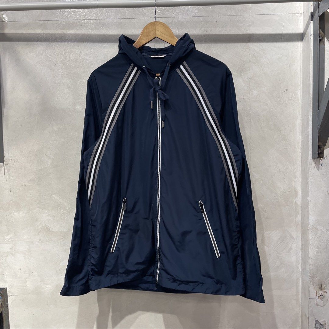 Hermes Packable Nylon Jacket (Category: Coats, Jackets and Outerwear) located in Manila. Submitted by walter_wt (Listing ID 1468571809, Image 1). Description: Hermès lightweight nylon jacket in deep navy blue, featuring a technical packable construction with a functional hood and full-zip front closure. Size- XXL Dimension- Length- 29 Width- 22 Sleeve length- 25 No issue .