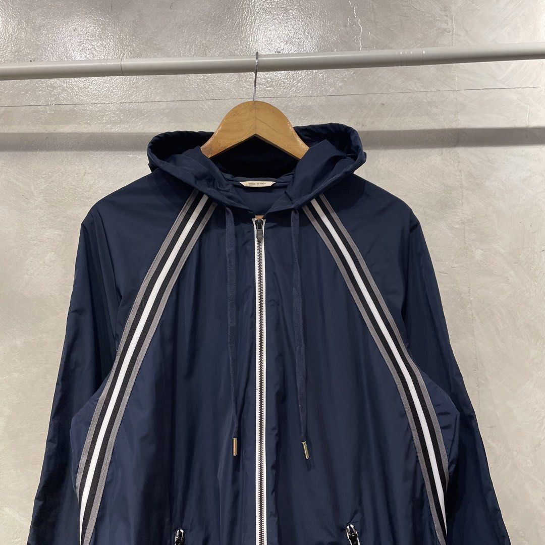 Hermes Packable Nylon Jacket (Category: Coats, Jackets and Outerwear) located in Manila. Submitted by walter_wt (Listing ID 1468571809, Image 2). Description: Hermès lightweight nylon jacket in deep navy blue, featuring a technical packable construction with a functional hood and full-zip front closure. Size- XXL Dimension- Length- 29 Width- 22 Sleeve length- 25 No issue .