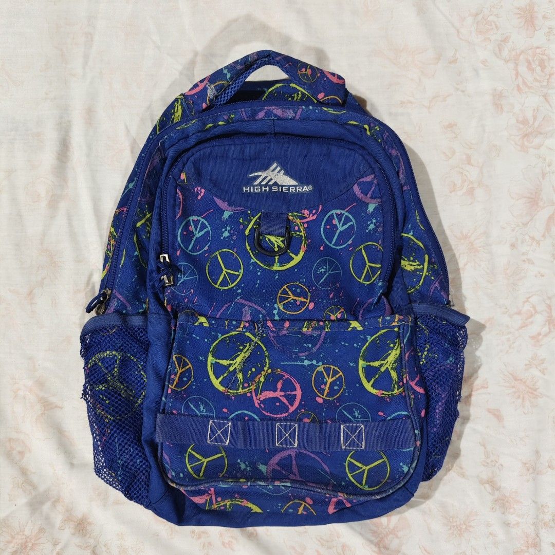 High Sierra blue colorful splatter backpack (Category: Backpacks) located in Bulacan. Submitted by angel.decluttersx (Listing ID 1468633453, Image 1). Description: L 17 inches W 13 inches issue: signs of usage: holes sa net ng bottle holder and minimal stitch sa handle (refer to photos) please buy at your own risk and manage your expectations.