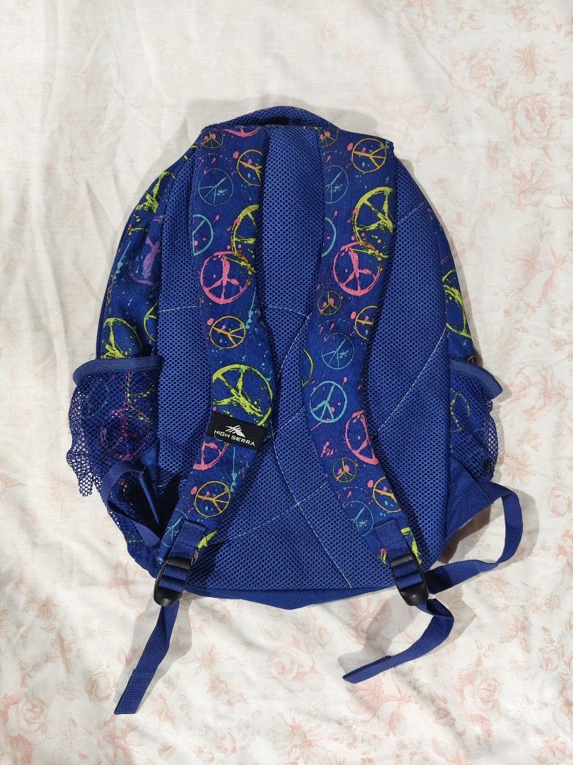 High Sierra blue colorful splatter backpack (Category: Backpacks) located in Bulacan. Submitted by angel.decluttersx (Listing ID 1468633453, Image 2). Description: L 17 inches W 13 inches issue: signs of usage: holes sa net ng bottle holder and minimal stitch sa handle (refer to photos) please buy at your own risk and manage your expectations.