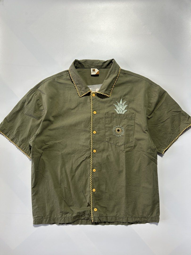 Olive Green Button Down Polo by Nationalist (Category: Tshirts & Polo Shirts ) located in Calamba. Submitted by twstwrld (Listing ID 1468602378, Image 1). Description: Hinahanap-Hanap Kita Polo Button Down by Nationalist size S fits Medium-Large 21x25 Boxy fit No issues Backprint is Stitches This item is not thrifted .