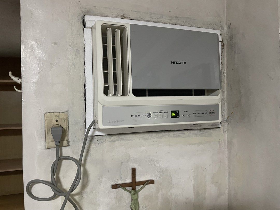 Hitachi DC Inverter Window Type Air Conditioner (Category: Air Conditioning and Heating) located in Quezon City. Submitted by tommysm12 (Listing ID 1468502678, Image 1). Description: - Brand: Hitachi Window Type Air Conditioner - Type: DC Inverter (Energy Saving) - Display: Digital temperature display - Controls: Front panel buttons for mode, fan speed, swing, timer, and power - Design: Modern grey and white housing with left-side louver vents - 
