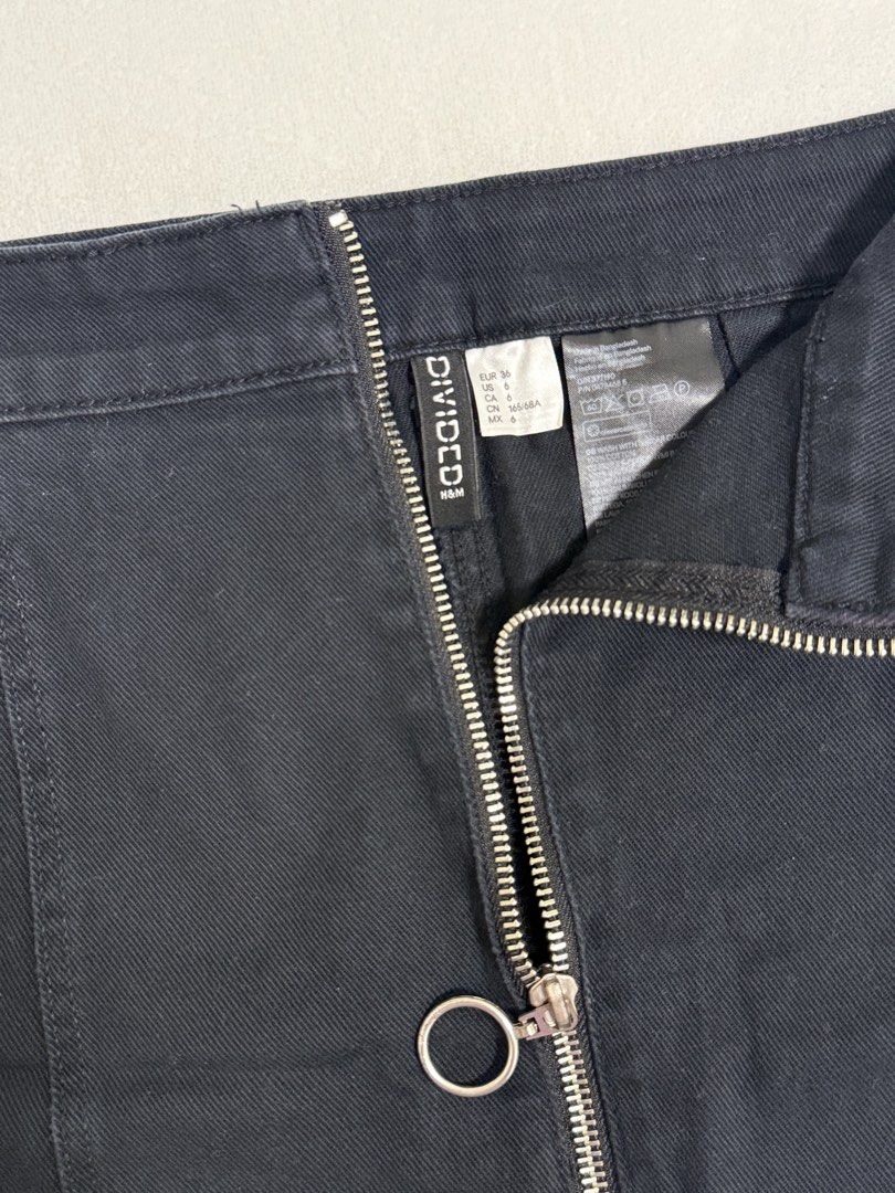 h&m divided black denim skirt zip front (Category: Skirts) located in Los Banos. Submitted by cheerioz_ (Listing ID 1468688279, Image 2). Description: brand: h&m divided style: black denim mini skirt with paneled design hardware: silver front zipper with a round pull ring size: eur 36 / us 6 condition: great basic piece, clean inside and out easy to style with tees or crop tops.