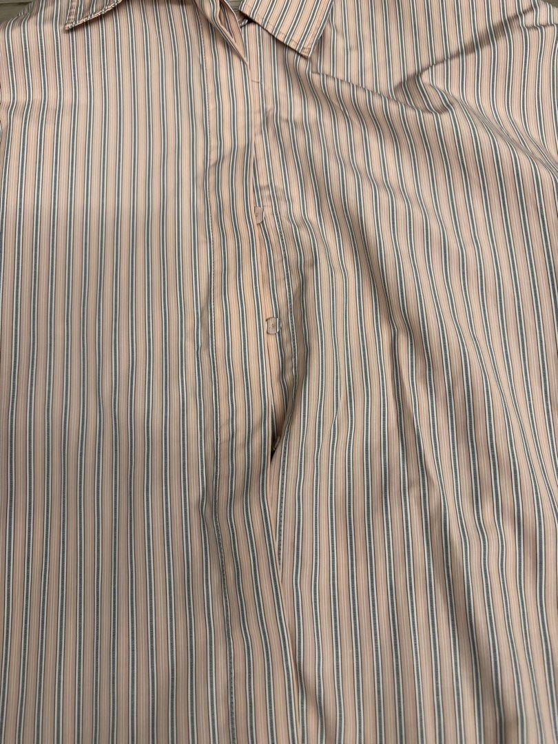 H&M Edition Striped Long Sleeve Button-Down Shirt (Category: Longsleeves) located in Taguig. Submitted by sqaumejada (Listing ID 1468526880, Image 2). Description: - Brand: H&M Edition - Design: Classic pink, white, and navy stripe pattern - Size: L (Universal EUR, US, CA, MX, CN sizing) - Features: Long sleeves with wide cuffs, standard collar, button front closure - Style: Clean look, easy to dress up or down for casual or smart occasions.