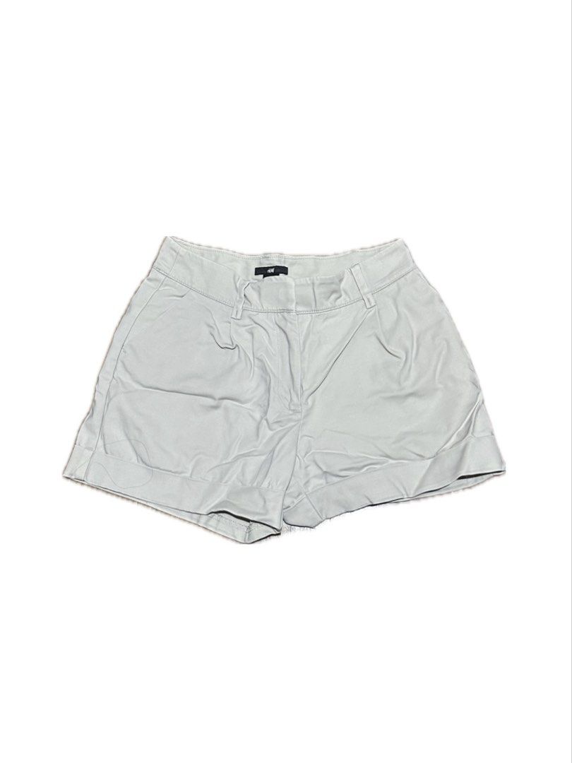 H&M Grey Cuffed Tailored Shorts (Category: Shorts) located in Manila. Submitted by yumidrobeee (Listing ID 1468545556, Image 1). Description: - Brand: H&M - Color: Grey - Style: Tailored shorts with minimalist design and front pleats - Details: Cuffed hems, belt loops, zip fly closure, and front pockets - Fabric: Lightweight and breathable, ideal for warm weather - Condition: Excellent / Ready to wear.