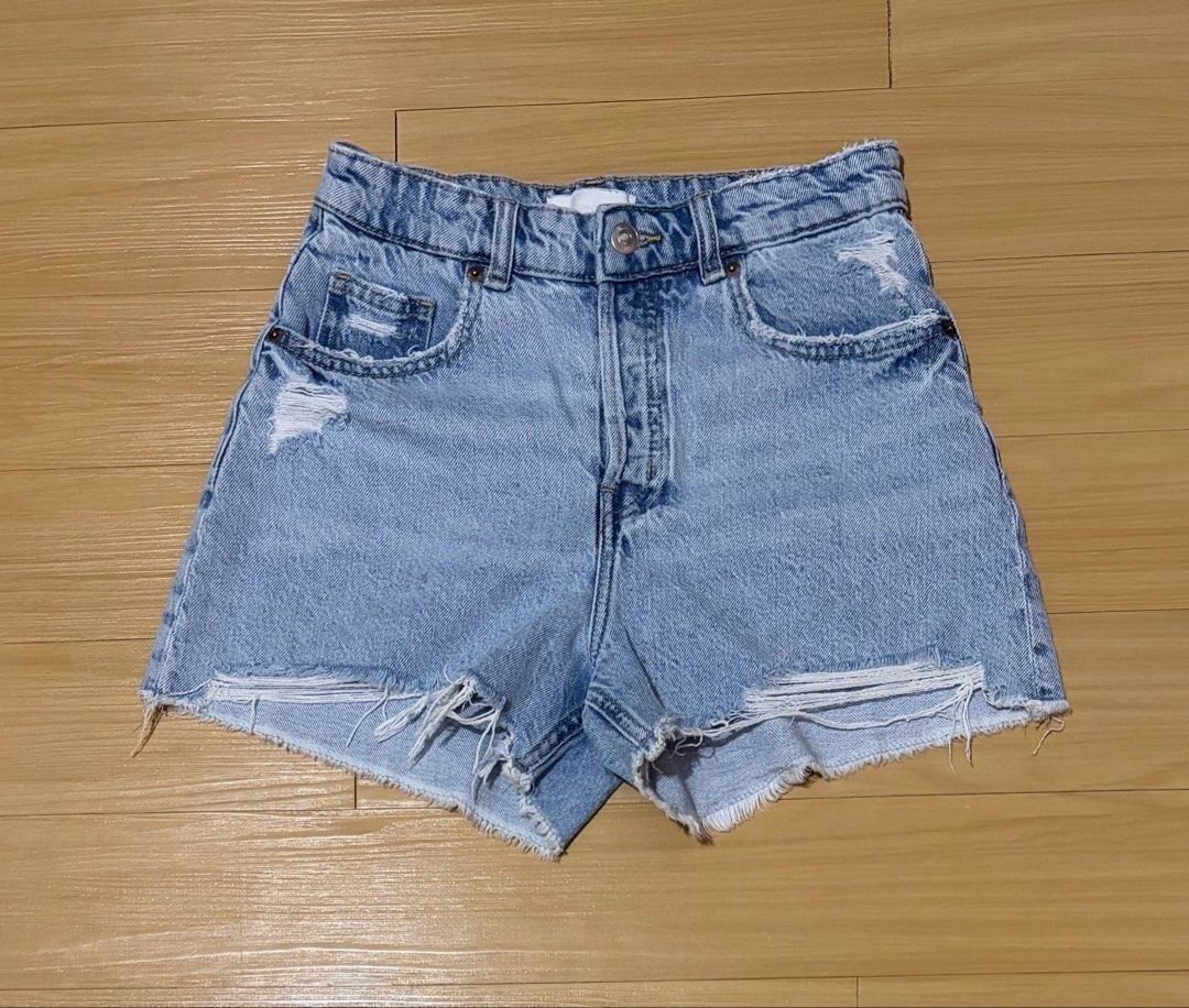 H&M High-Rise Button-Fly Distressed Denim Shorts US 4 (Category: Shorts) located in Quezon City. Submitted by garagesale2026 (Listing ID 1468706559, Image 1). Description: - Preloved - In very good condition - Light wash denim; Frayed hem - Waist: 27".