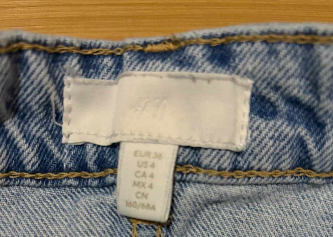 H&M High-Rise Button-Fly Distressed Denim Shorts US 4 (Category: Shorts) located in Quezon City. Submitted by garagesale2026 (Listing ID 1468706559, Image 3). Description: - Preloved - In very good condition - Light wash denim; Frayed hem - Waist: 27".