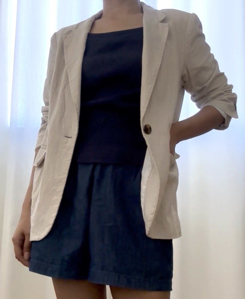H&M Linen Blazer in Beige (Category: Coats, Jackets and Outerwear) located in Mandaluyong City. Submitted by trishi.trish (Listing ID 1468568306, Image 2). Description: - Brand: H&M - Size: XS - Color: Beige - Closure: Front single button - Pockets: Two functional flap pockets - Lining: Fully lined in white - Measurements: Provided in the photos - Swipe to see when worn photos - In great condition - Fully lined - Material: Linen ane viscose blend