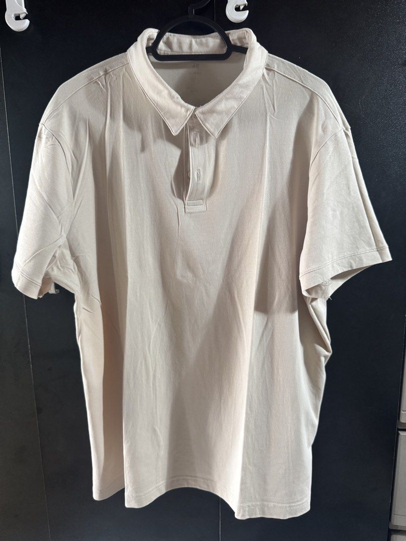 H&m Polo ashirt (Category: Tshirts & Polo Shirts ) located in Quezon City. Submitted by easybreezy26 (Listing ID 1468500135, Image 1). Description: H&M Polo shirt, beige Size : Large (Slim fit) W-22 L-26 Antipolo Simbahan Meet-up.